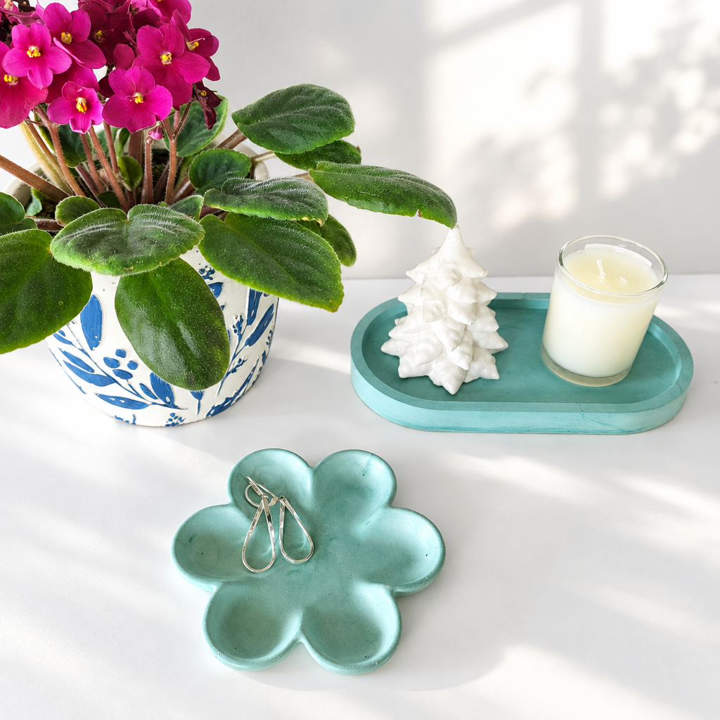 Green flower dish and oblong tray with a lighter, natural-light background