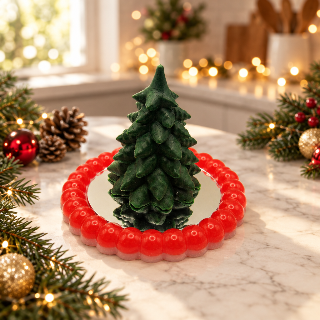 Red-rim mirrored tray with tree on a holiday kitchen counter